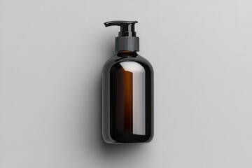 Black plastic pump bottle for liquid dispensing on light gray background