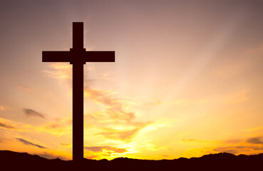 Good Friday. Friday before Easter. Christian cross against the sunset