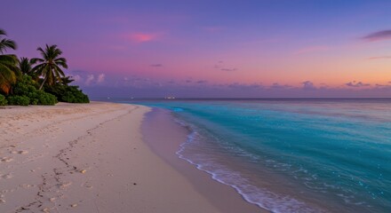 Tranquil beach at sunset with vibrant sky and calm sea 