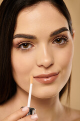 Obraz premium Captivating young woman showcases flawless skin in a professional beauty studio