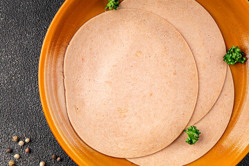 Sausage vegetarian seitan soy product ingredients legume no meat appetizer vegetables dish fresh gourmet food background on the table rustic food top view copy space diet vegetarian and vegan food