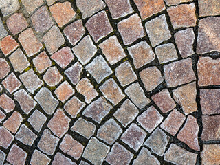 Eis auf Pflastersteinen