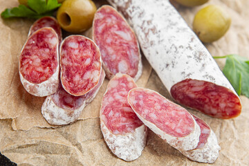 Fuet sausage Spanish meat delicacy fresh delicious gourmet food background on the table rustic food...