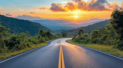 Winding road through verdant mountains at sunset creating a peaceful vista