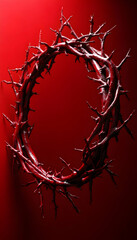 Red crown of thorns casting shadows on a simple red backdrop