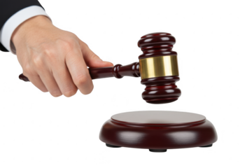 A judge hand holding a wooden gavel poised above a circular wooden sound block isolated on transparent background