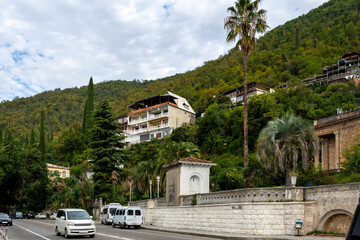Gagra, Abkhazia-October 11 2024 : Old historical building with columns among the mountains in the...