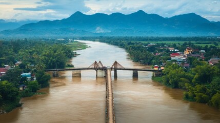 Obraz premium Scenic river view with a bridge laos landscape photography natural beauty aerial perspective tranquility and serenity