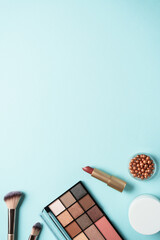 Make up products on blue.