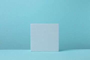 White podium on a blue background