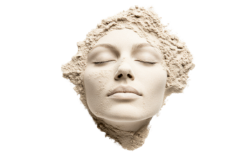 Face covered in sand creating an artistic expression of calmness