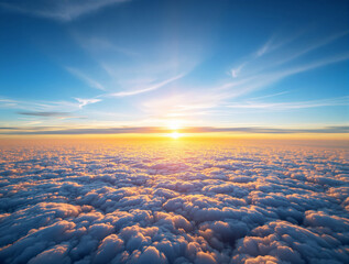 Obraz premium Majestic sunrise over a cloudscape with warm golden light and blue sky, creating a breathtaking atmospheric landscape. Ai generative