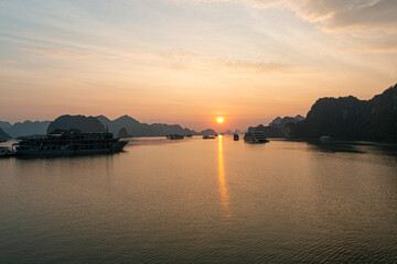 Cruise ships at sunrise in Ha Long Bay, Vietnam