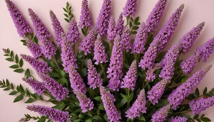 Naklejka premium A high-angle, full shot presents a collection of purple flowers arranged on the lower right side against a light pink background