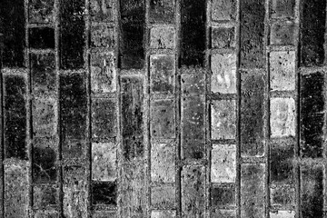 Black and white brick texture worn grunge background
