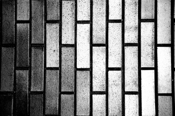 Black and white brick texture worn grunge background
