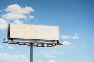 White blank billboard against sky