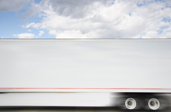 Semi truck trailer on highway