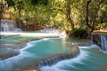 Turquoise pools and natural terraces at Kuang Si Falls, Laos