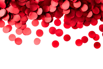 Colorful red confetti scattered on a transparent surface