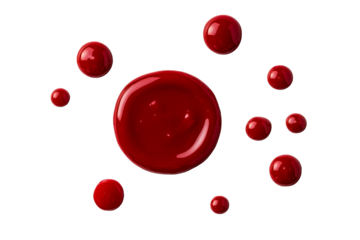 Red paint drops arranged in artistic pattern on transparent background