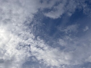 beautiful morning blue sky gradation sunrise sky background, beautiful cloudy sky sunlight from the side, dramatic feel, it's going to rain