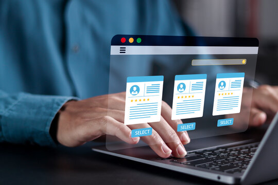 HR managers recruiting are reviewing candidate profiles on digital screen. Modern recruitment technology in hiring, employee evaluation and online screening.