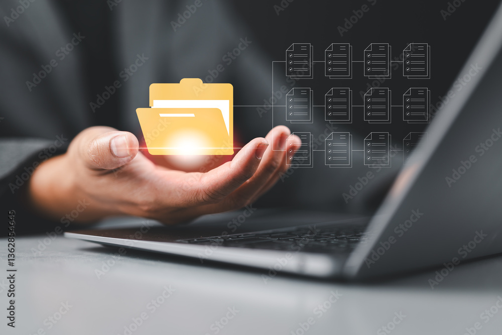 Aufkleber DMS Document management and archiving storage system Concept, Businessman hold digital folders and documents online and Use laptops to search document files data, Software for efficient archiving