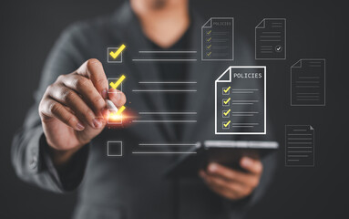 Checklist online document practices and policies concept, Businessman use tablets to check steps...