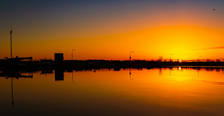 Sunset with reflections near Straubing, Danube, Straubing-Bogen, Bavaria, Germany