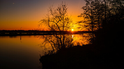 Naklejka premium Sunset with reflections near Straubing, Danube, Straubing-Bogen, Bavaria, Germany