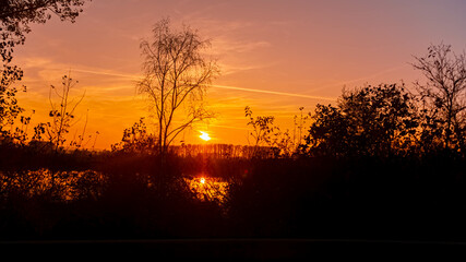 Sunset with reflections near Mamming, Isar, Dingolfing-Landau, Bavaria, Germany