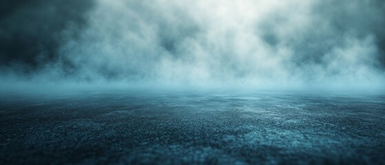 Abstract background with blue smoke on a dark surface, creating a mysterious atmosphere. Ideal for backgrounds in website design, cover art or promotional materials.