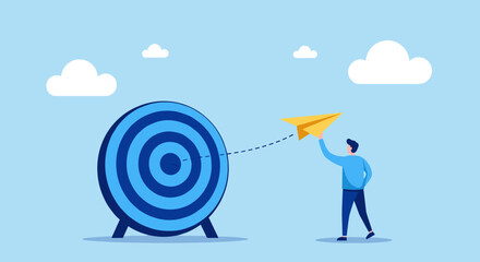 Man aiming for success with paper plane.