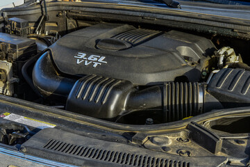 Close up of computer-controlled V 6 automobile motor.
