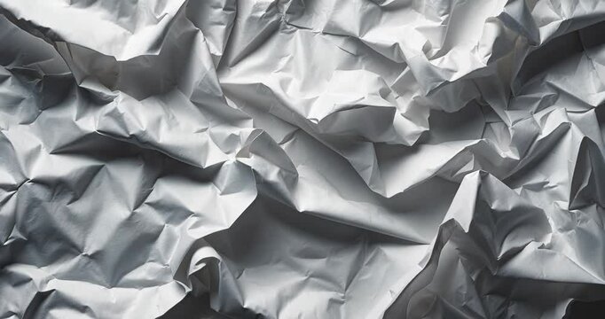 Crumpled and creased white paper texture for a blank poster.