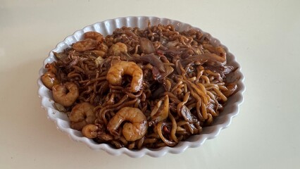Stir-fried black bean noodles with shrimp and vegetables