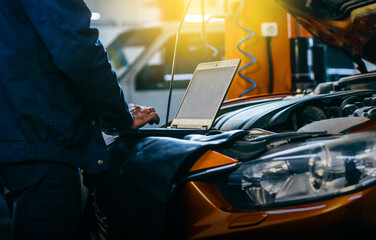 Car care maintenance and servicing, Hand technician auto mechanic checking inspection list after...