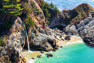 McWay Falls on Highway 1 and Big Sur along the Pacific Ocean coast, beautiful landscape and aerial...
