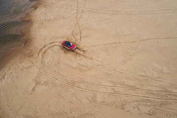 Top view stuck car beach