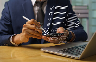 Business personnel use mobile phones for online audit investigations and manage electronic...