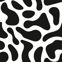High quality black and white seamless pattern with cow and dalmatian spots. Perfect for decor, textiles, and wallpapers. Irregular shapes add a bold, modern touch.