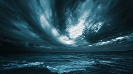 Obraz premium Horror black-blue sky with eerie swirling clouds over a haunted sea, creating a gloomy, mysterious atmosphere.