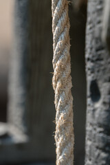 A tiny well with water coming from a bucket