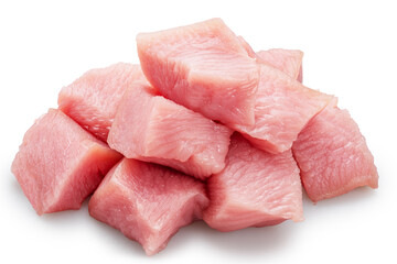 Pile of raw turkey meat pieces isolated on white. File contains clipping path.