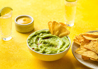 Nachos with guacamole, traditional Mexican snack