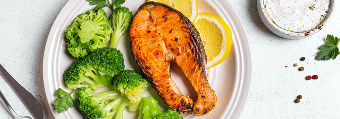 Grilled salmon fish steak with steamed vegetables