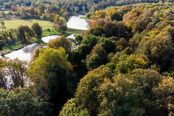 A bird's-eye perspective of a natural park with water bodies