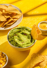 Nachos with guacamole, traditional Mexican snack