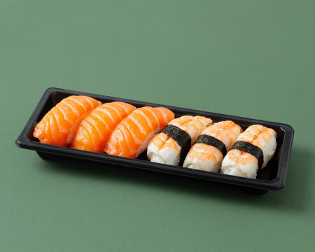 Close up of nigiri sushi assortment in black tray